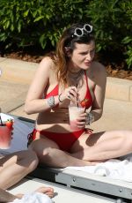 BELLA and DANI THORNE in Bikinis at a Pool in Miami 03/13/2019
