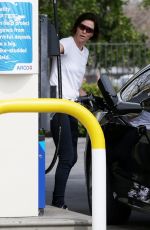 CHARLIZE THERON at a Gas Station in Los Angeles 03/19/2019