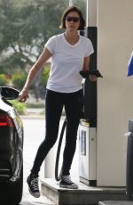 CHARLIZE THERON at a Gas Station in Los Angeles 03/19/2019