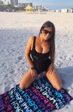 CLAUDIA ROMANI in Bikini Celebrates St Patrick