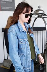DAKOTA JOHNSON in Double Denim at LAX Airport in Los Angeles 03/01/2019
