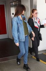 DAKOTA JOHNSON in Double Denim at LAX Airport in Los Angeles 03/01/2019