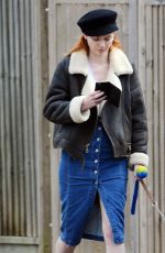 ELEANOR TOMLINSON with Her Dog at a Park in London 03/29/2019
