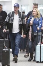 ELISABETH MOSS Arrives at Airport in Toronto 03/12/2019