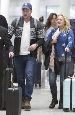 ELISABETH MOSS Arrives at Airport in Toronto 03/12/2019