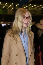 ELLE FANNING at Charles De Gaulle Airport in Paris 03/02/2019