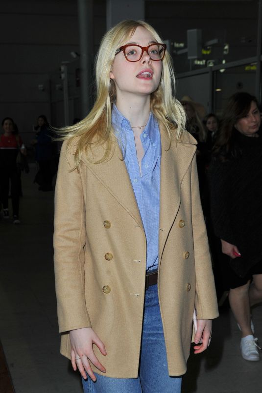 ELLE FANNING at Charles De Gaulle Airport in Paris 03/02/2019