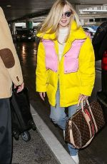 ELLE FANNING at Los Angeles International Airport 03/06/2019