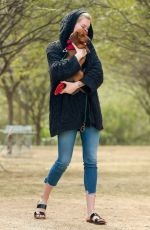 IRELAND BALDWIN out with her Dog at a Park in Los Angeles 03/19/2019