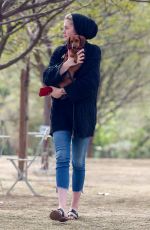 IRELAND BALDWIN out with her Dog at a Park in Los Angeles 03/19/2019