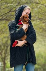 IRELAND BALDWIN out with her Dog at a Park in Los Angeles 03/19/2019
