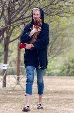 IRELAND BALDWIN out with her Dog at a Park in Los Angeles 03/19/2019