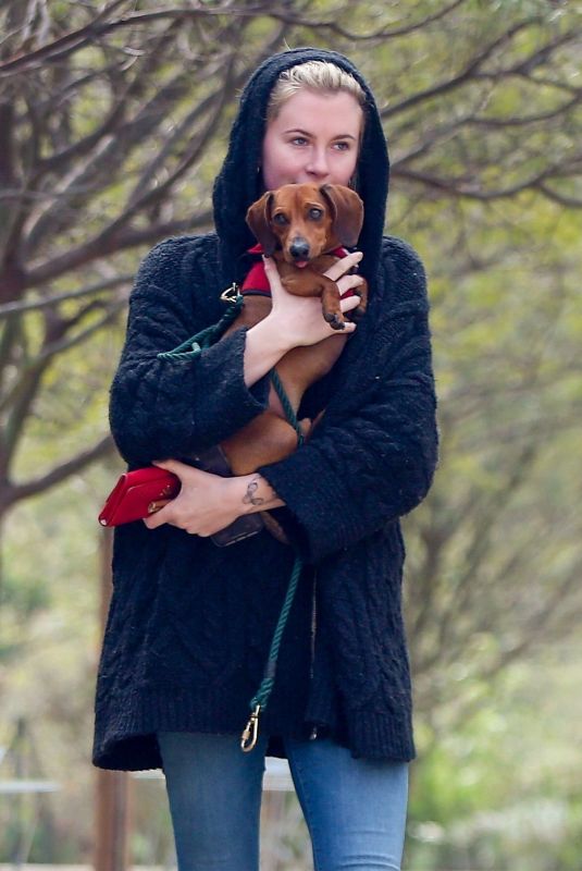 IRELAND BALDWIN out with her Dog at a Park in Los Angeles 03/19/2019