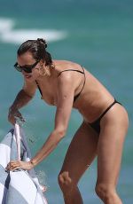 IRINA SHAYK in Bikini at a Beach in Miami 03/07/2019