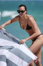 IRINA SHAYK in Bikini at a Beach in Miami 03/07/2019