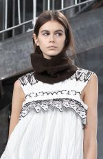 KAIA GERBER at Sacai Runway Show at Paris Fashion Week 03/04/2019