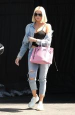 KHLOE KARDASHIAN in Ripped Jeans Out in Los Angeles 03/29/2019