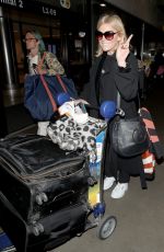 MICHELLE COLLINS at LAX Airport in Los Angeles 03/13/2019