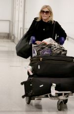 MICHELLE COLLINS at LAX Airport in Los Angeles 03/13/2019
