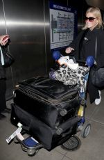 MICHELLE COLLINS at LAX Airport in Los Angeles 03/13/2019