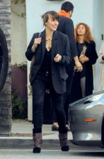 MILLA JOVOVICH Leaves Spago in Beverly Hills 03/07/2019