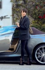 MILLA JOVOVICH Leaves Spago in Beverly Hills 03/07/2019