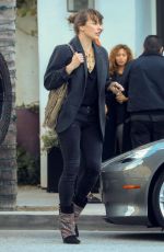 MILLA JOVOVICH Leaves Spago in Beverly Hills 03/07/2019