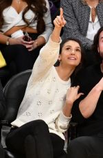 NINA DOBREV and Grant Mellon at a Basketball Game in Los Angeles 03/26/2019