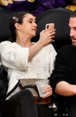 NINA DOBREV and Grant Mellon at a Basketball Game in Los Angeles 03/26/2019