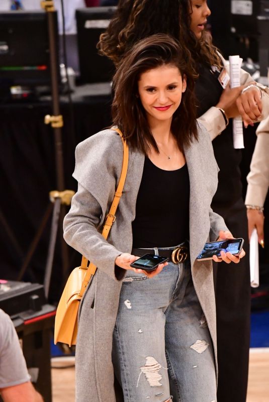 NINA DOBREV at Cleveland Cavaliers vs New York Knicks Game in New York 02/28/2019