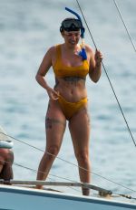OLIVIA BUCKLAND in Bikini on Vacation in Bridgetown 03/24/2019