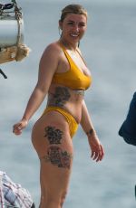 OLIVIA BUCKLAND in Bikini on Vacation in Bridgetown 03/24/2019