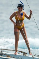 OLIVIA BUCKLAND in Bikini on Vacation in Bridgetown 03/24/2019