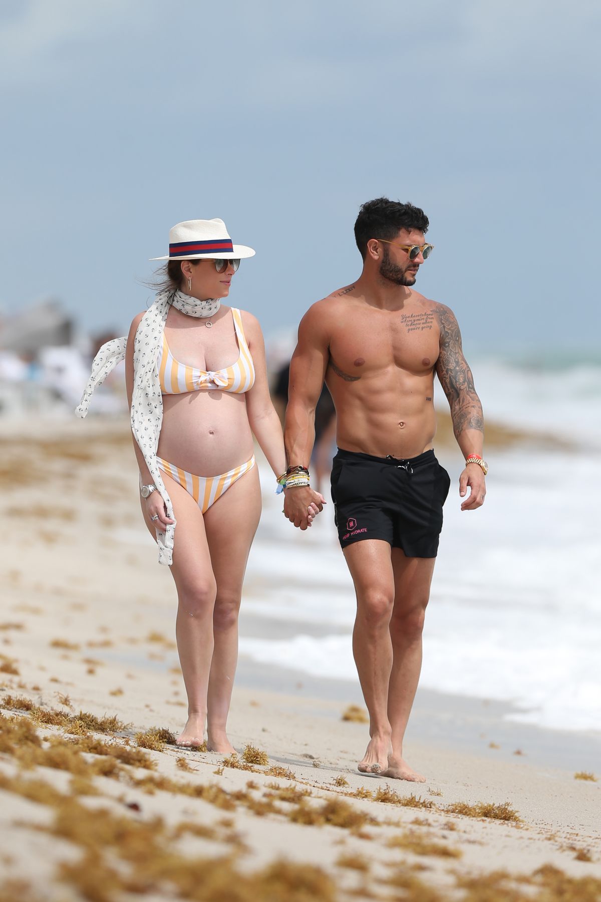 Pregnant CHLOE MELAS in Bikini at a Beach in Miami 03/08/2019.