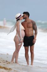 Pregnant CHLOE MELAS in Bikini at a Beach in Miami 03/08/2019