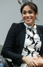Pregnant MEGHAN MARKLE at International Women