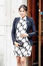 Pregnant MEGHAN MARKLE at International Women