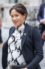 Pregnant MEGHAN MARKLE at International Women
