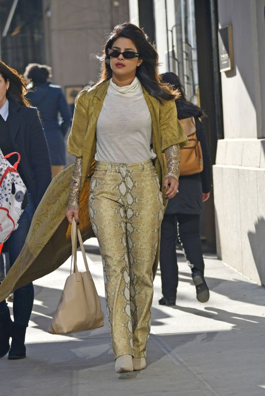 PRIYANKA CHOPRA in Snakeskin Pants and Gold Coat Out in New York 03/19/2019