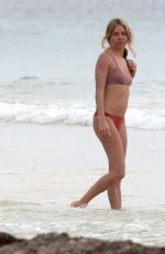 SIENNA MILLER in Red Bikini at a Beach in Tulum 03/22/2019