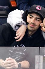 SOPHE TURNER and Joe Jonas Kissing at Detroit Red Wings vs New York Rangers Ice Hockey Game in New York 03/19/2019