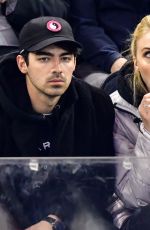 SOPHE TURNER and Joe Jonas Kissing at Detroit Red Wings vs New York Rangers Ice Hockey Game in New York 03/19/2019