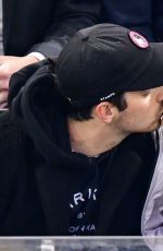 SOPHE TURNER and Joe Jonas Kissing at Detroit Red Wings vs New York Rangers Ice Hockey Game in New York 03/19/2019