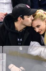 SOPHE TURNER and Joe Jonas Kissing at Detroit Red Wings vs New York Rangers Ice Hockey Game in New York 03/19/2019