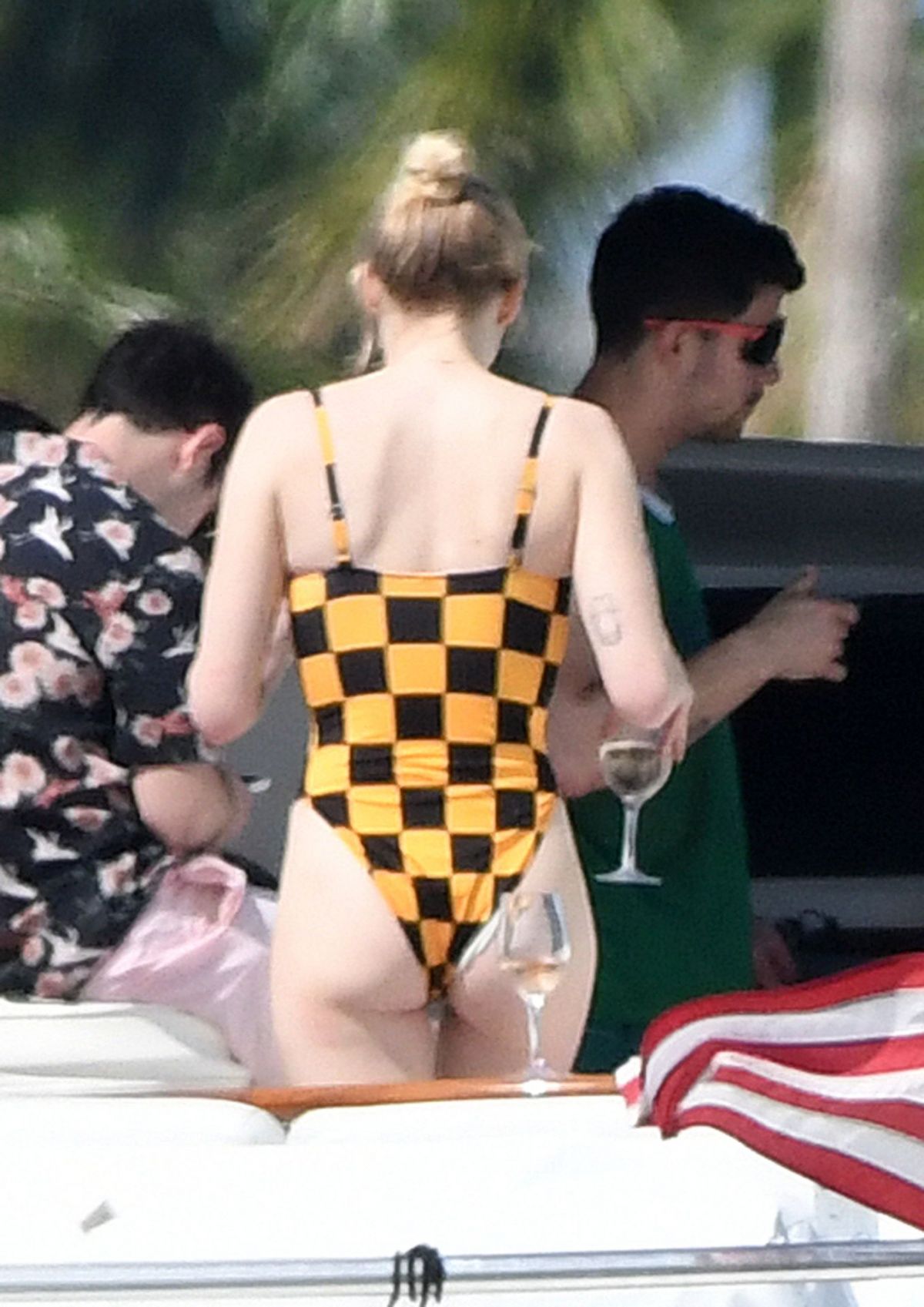 SOPHIE TURNER in Swimsuit at a Boat in Miami 03/25/2019.