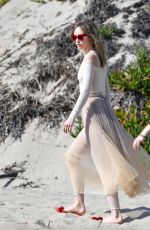 SUKI WATERHOUSE on the Set of a Photoshoot at Zuma Beach in Malibu 03/24/2019