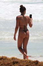 ASHLEY MOORE in Bikini on the Beach in Tulum 04/22/2019