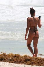 ASHLEY MOORE in Bikini on the Beach in Tulum 04/22/2019
