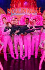 CARA DELEVINGNE and ASHLEY BENSON Poses with Moulin Rouge Dancers in Paris 04/09/2019