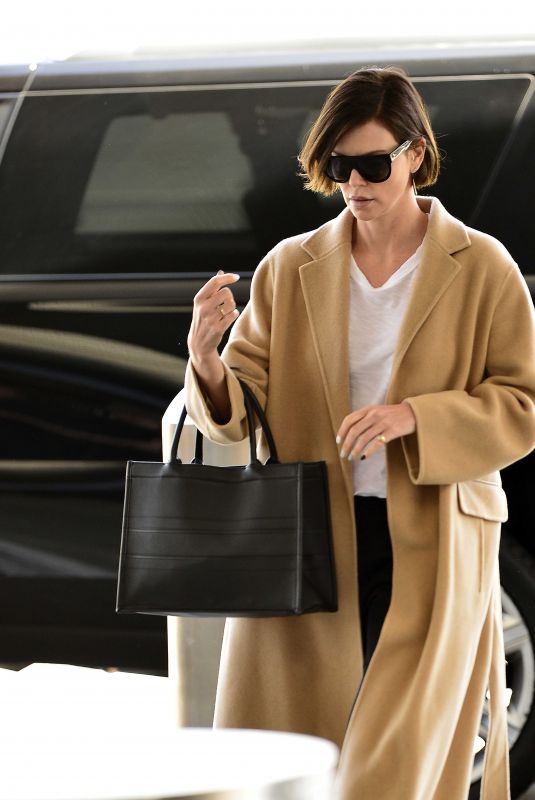 CHARLIZE THERON at LAX Airport in Los Angeles 04/22/2019